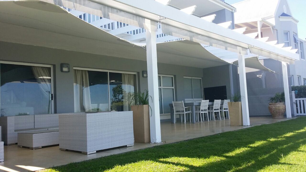 A white canopy extending a veranda