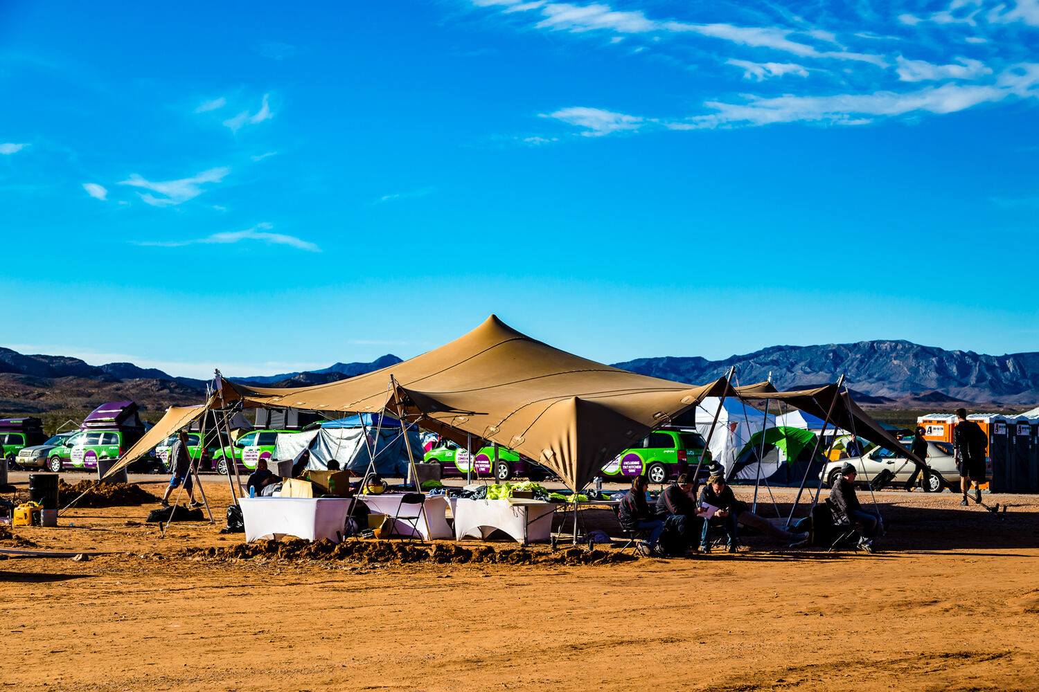 A large chino stretch tent in the open desert